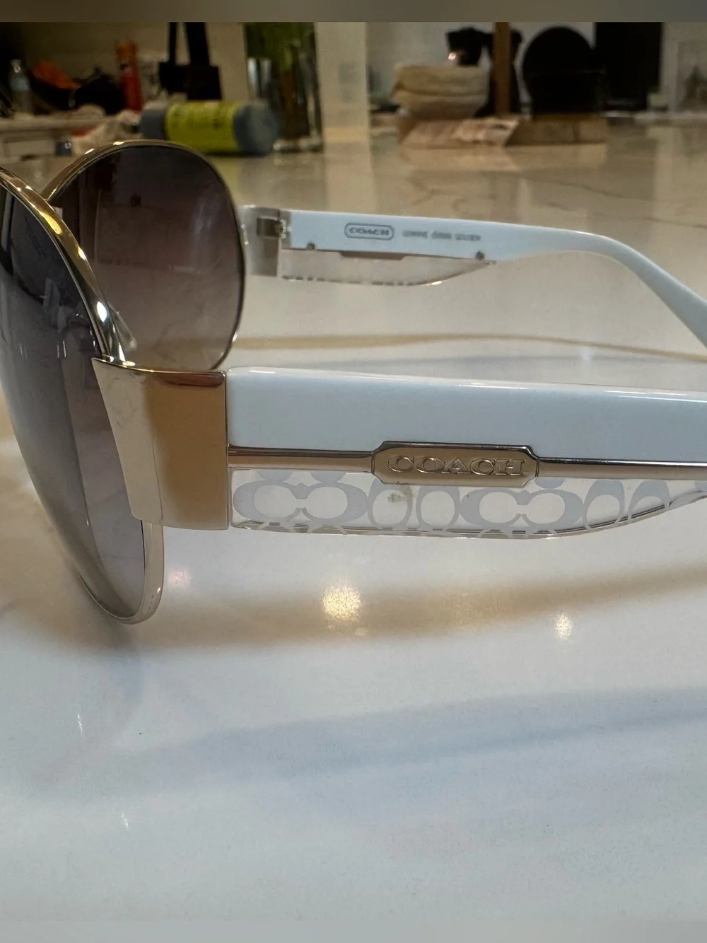 Women’s Coach Leanne S566 wrap golden sunglasses. White with signature C